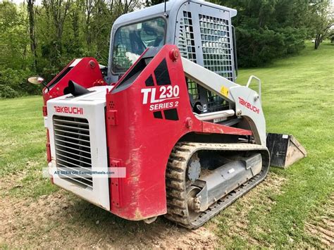 how many yards in a skid steer bucket tl230|tl230 series 2 specs.